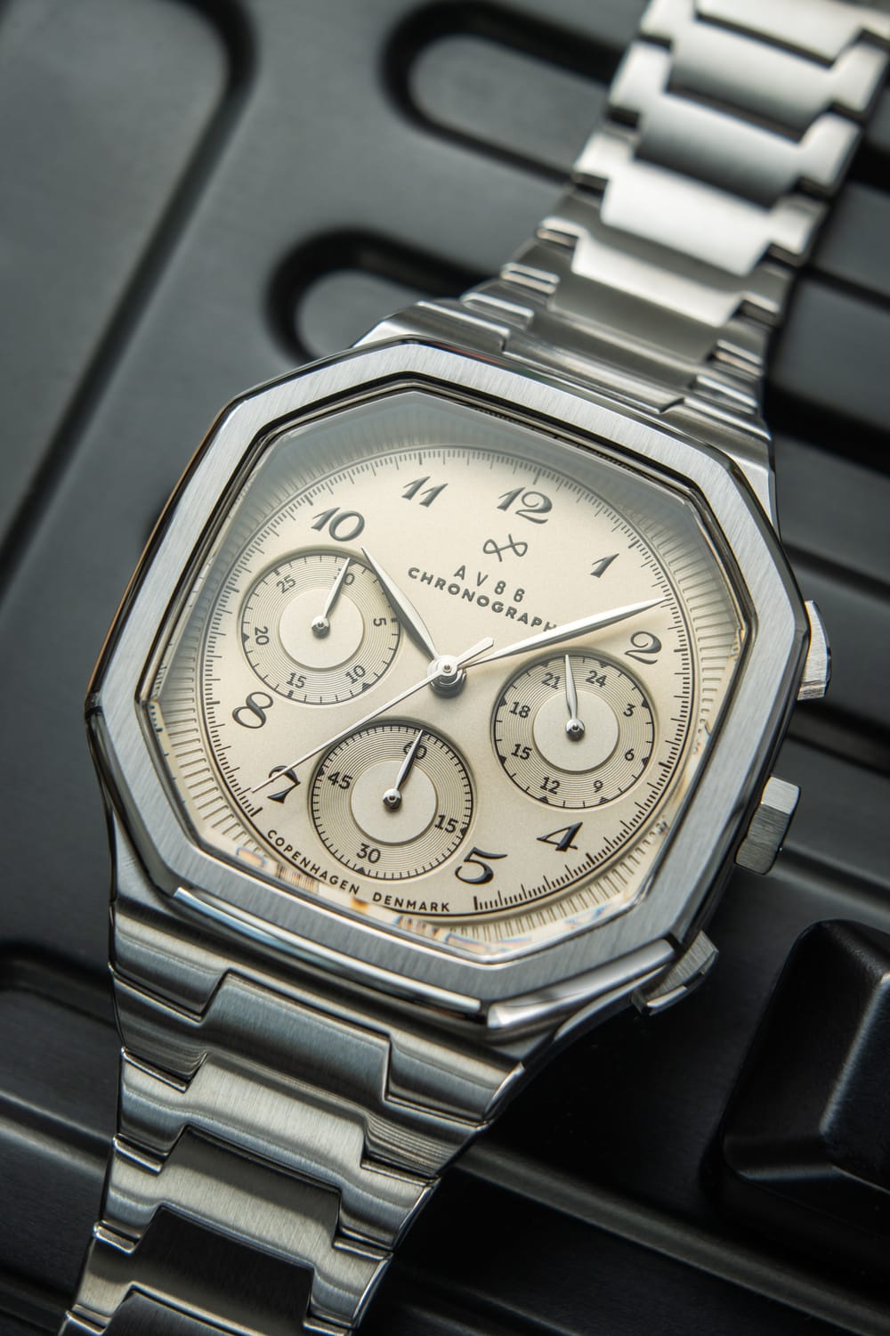 1904 Chronograph by AV86 with angular case, sapphire crystal, vintage-inspired dial, and integrated steel bracelet strap