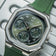 1904 Chronograph by AV86 with vintage-inspired angular case, sapphire crystal, chronograph dial, and green rubber strap