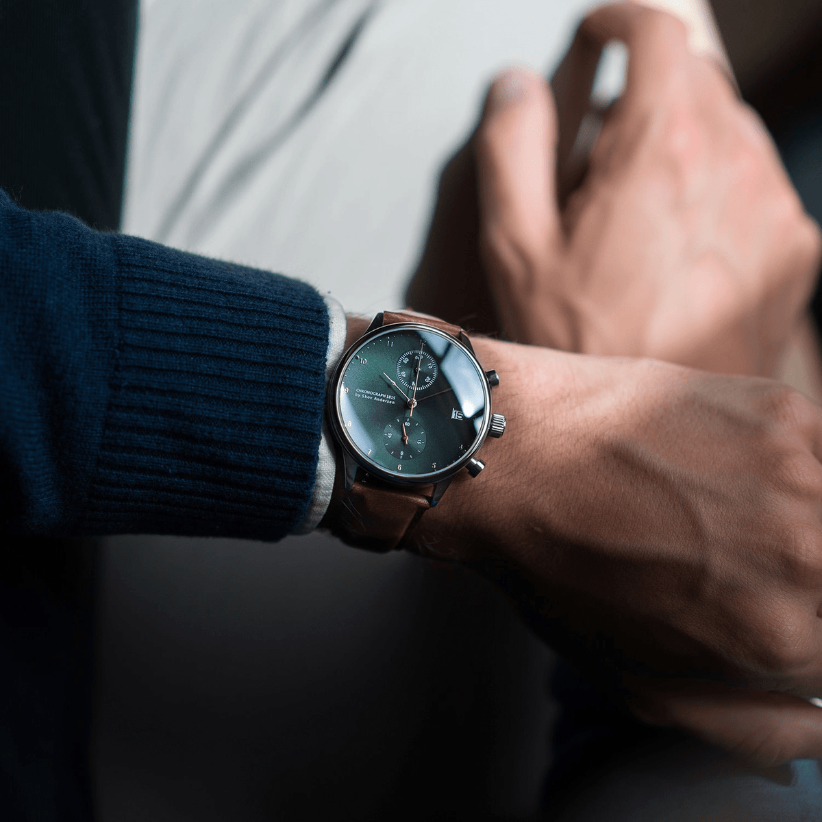 1815 Chronograph by AV86 with vintage-inspired dial, sapphire crystal, chronograph function, and brown leather strap on wrist