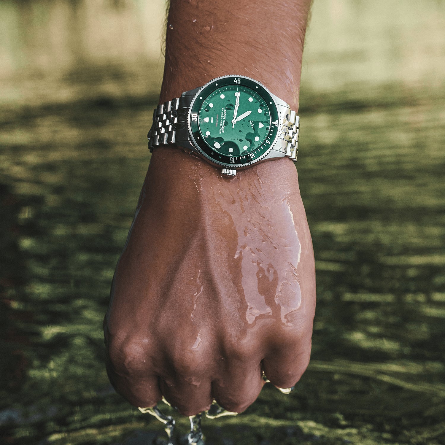 1926 At'sea by AV86 vintage-inspired diver with green sunray dial, sapphire crystal, rotating bezel, and stainless steel bracelet strap