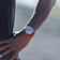 1815 Justin Gatlin by AV86 vintage-inspired chronograph with sapphire crystal and orange fabric strap on wrist