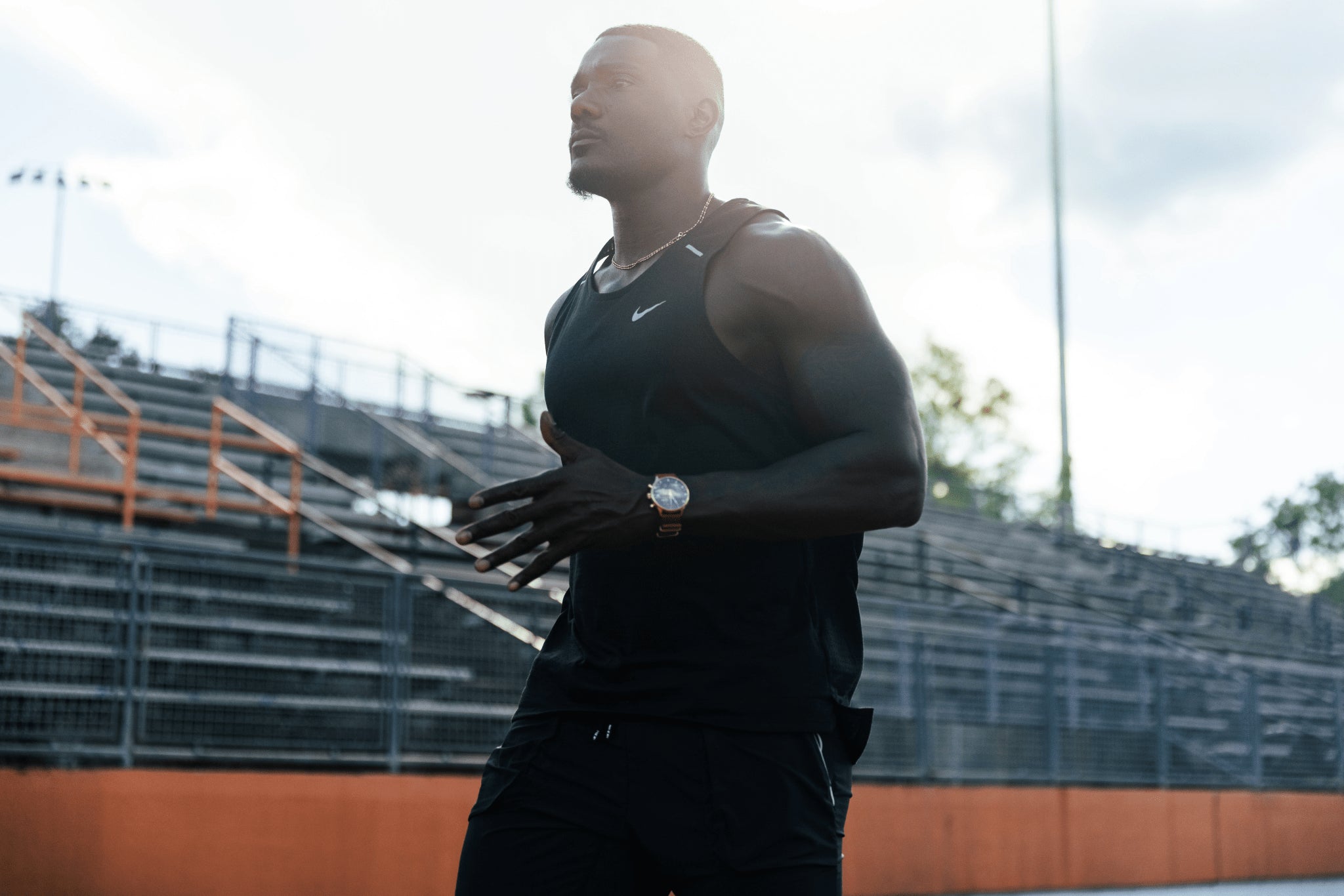 1815 Justin Gatlin, Gold / Blue Turtle by AV86 vintage-inspired chronograph with sapphire crystal and leather strap worn during athletic training