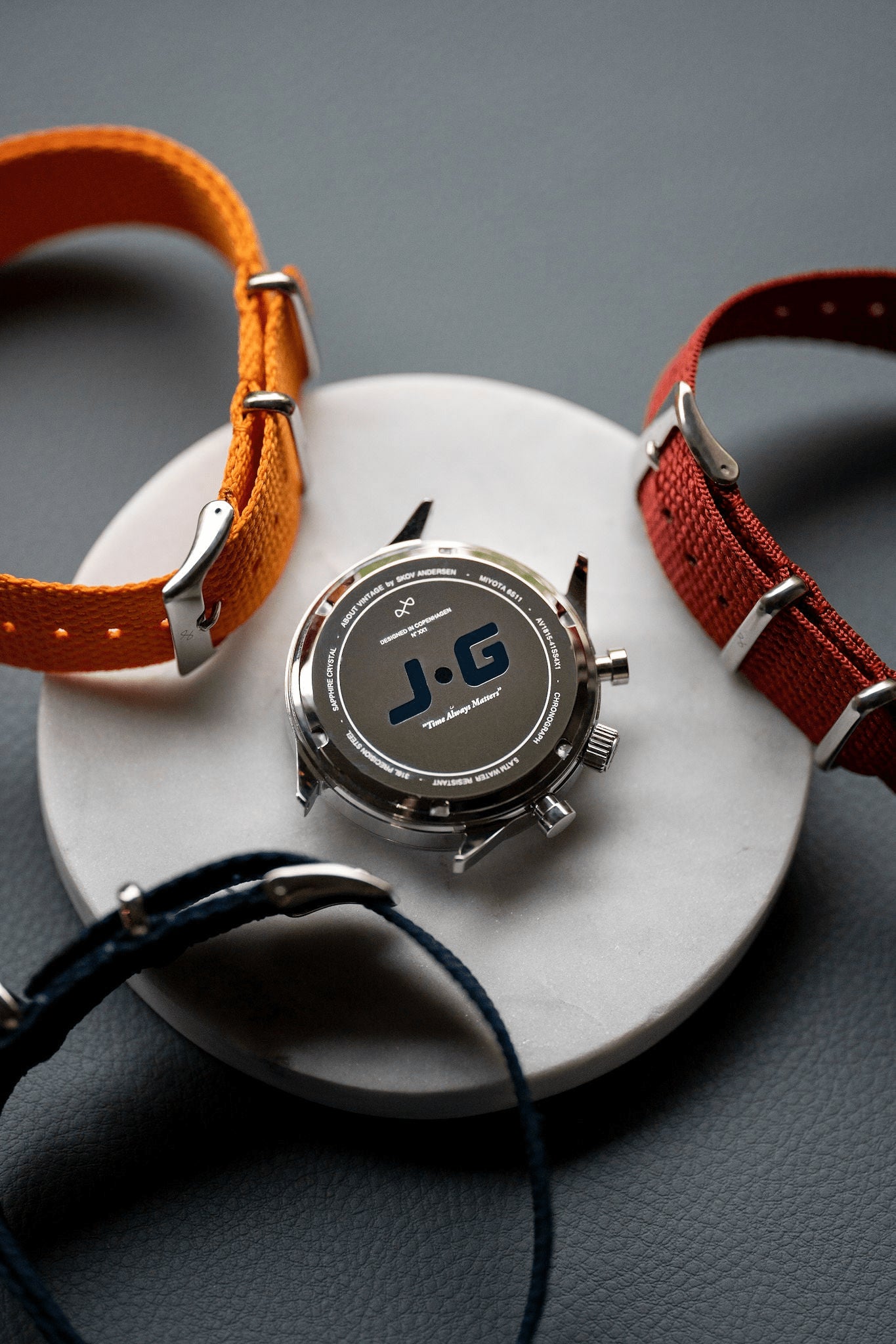 1815 Justin Gatlin by AV86 chronograph caseback with engraved details and three interchangeable fabric straps