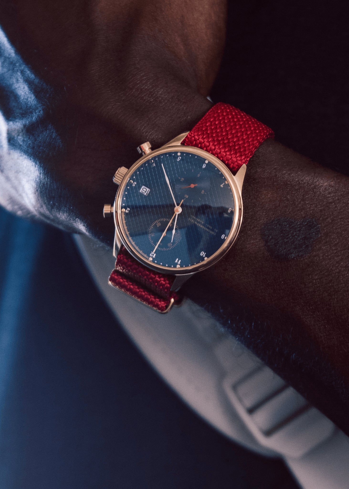 1815 Justin Gatlin, Gold / Blue Turtle vintage-inspired chronograph with sapphire crystal and red fabric strap by AV86