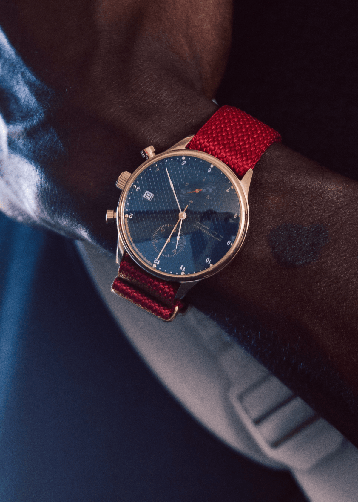 1815 Justin Gatlin, Gold / Blue Turtle vintage-inspired chronograph with sapphire crystal and red fabric strap by AV86