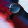1815 Justin Gatlin by AV86 luxury chronograph with sapphire crystal, textured dial, and red woven fabric strap on wrist