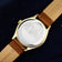 1968 Sixtyeight by AV86 vintage-inspired dress watch with sapphire crystal, polished case, and brown leather strap reverse detailing