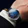 1968 Sixtyeight by AV86 vintage-inspired dress watch with sapphire crystal, blue sunray dial, and black leather strap