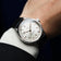 1968 Sixtyeight by AV86 vintage-inspired dress watch with sapphire crystal, elegant dial, and black leather strap on wrist
