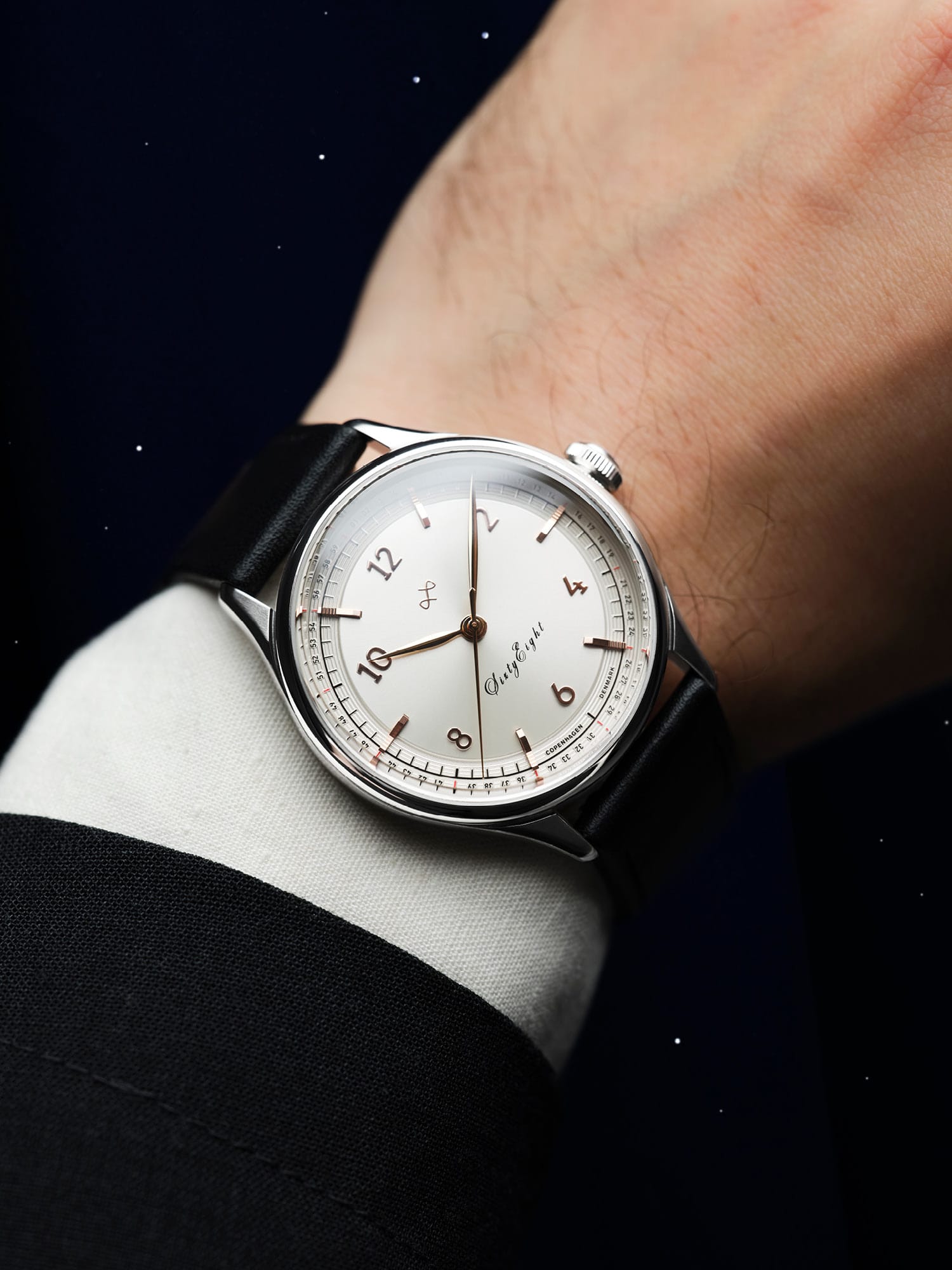 1968 Sixtyeight by AV86 vintage-inspired dress watch with sapphire crystal, elegant dial, and black leather strap on wrist