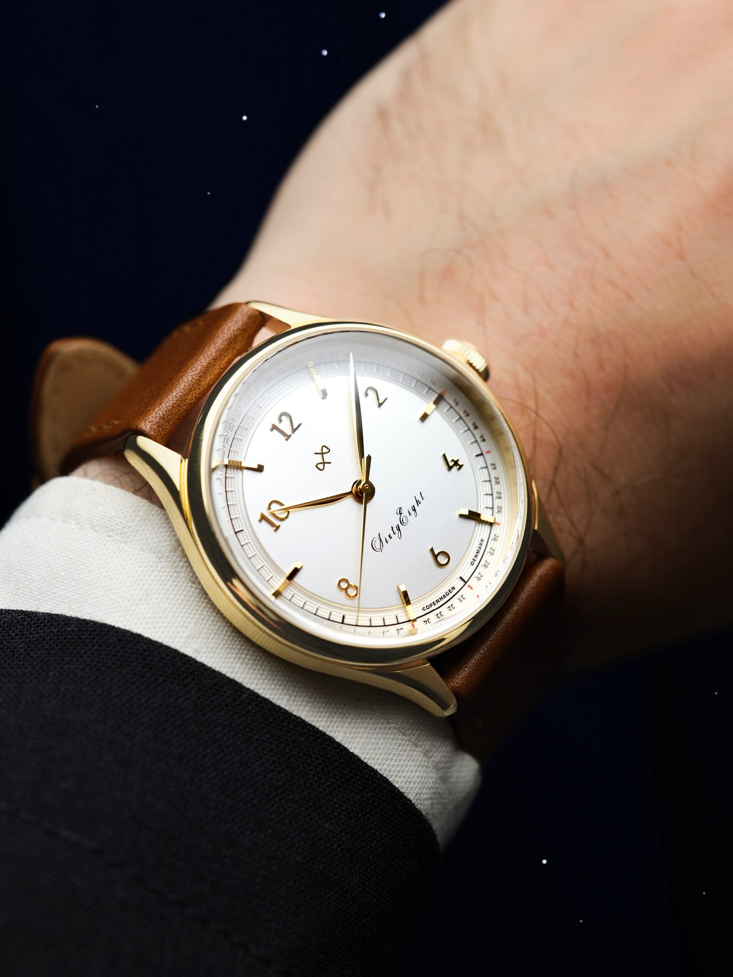 1968 Sixtyeight by AV86 dress watch with vintage-inspired dial, sapphire crystal, gold case, and brown leather strap